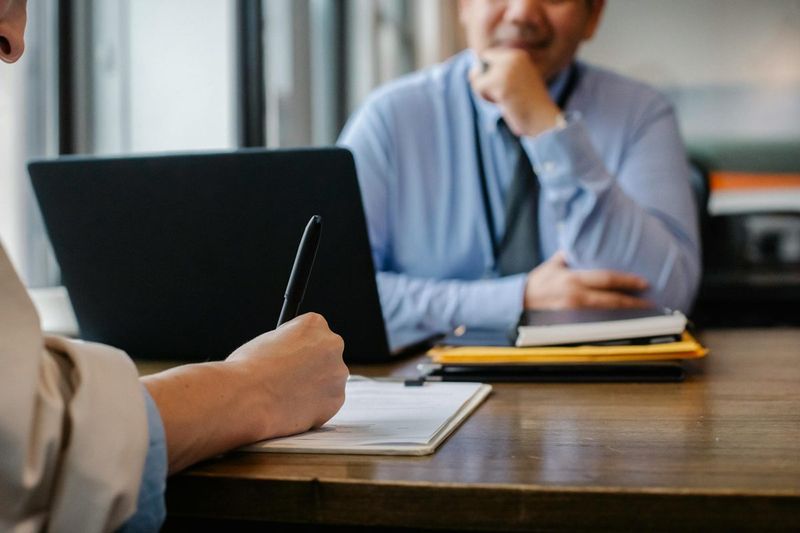 Legal professionals working together at a desk